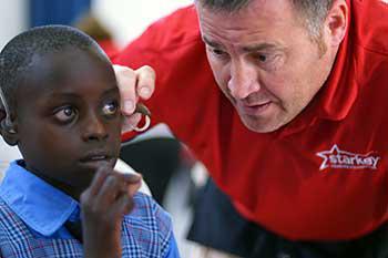 Mission trip - examining child's ear